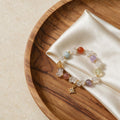 Natural crystal pebble multi-color bead bracelet with North Star pendant